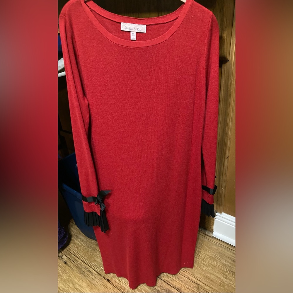 Red sweater dress with black trim